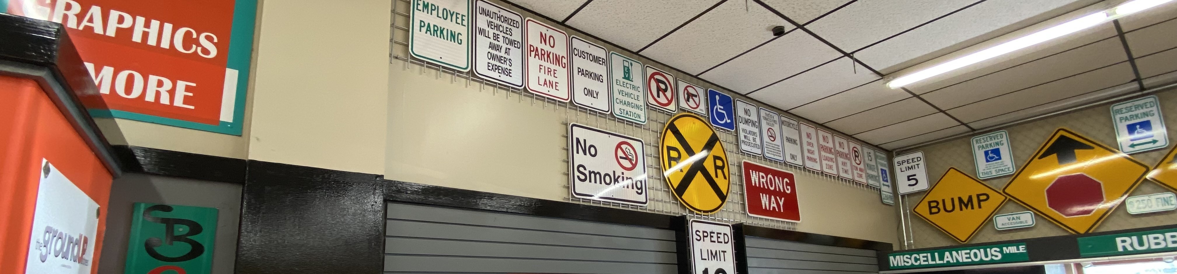  A variety of parking signs mounted on a wall